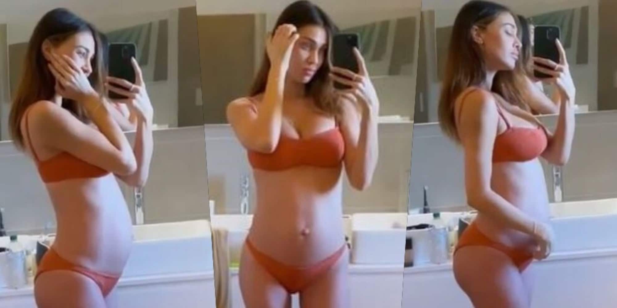 Belen in intimo allo specchio: carezze, sorrisi e pancione
