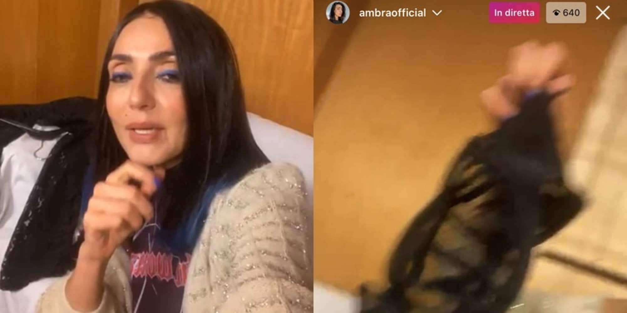 Ambra Angiolini e la diretta con mini slip e calze a rete...