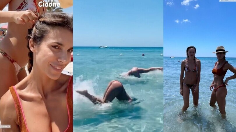 Elisabetta Canalis, trecce e acrobazie in acqua