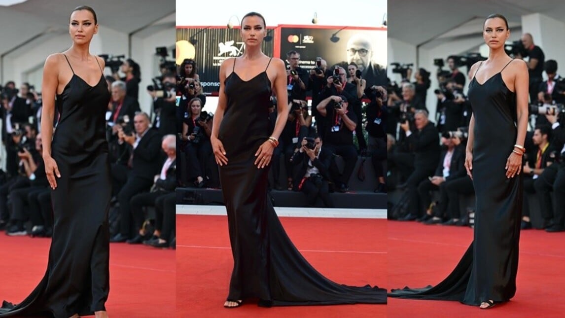 Irina Shayk ammalia in total black e cat eye sul red carpet di Venezia 79