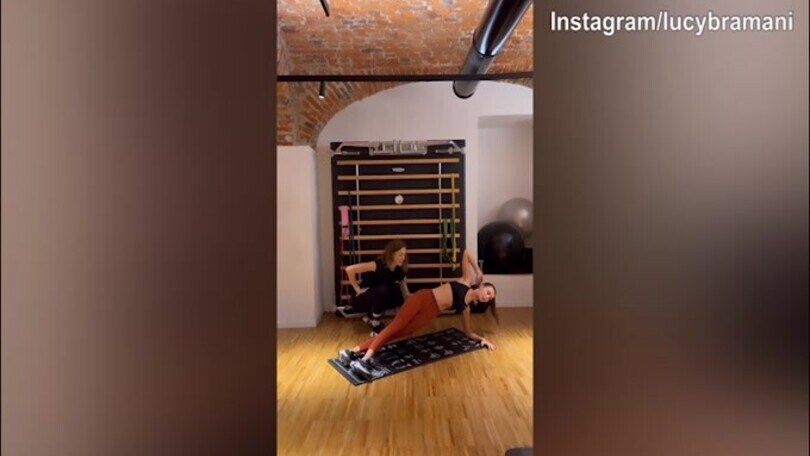 Lady Chiesa si allena duramente in palestra