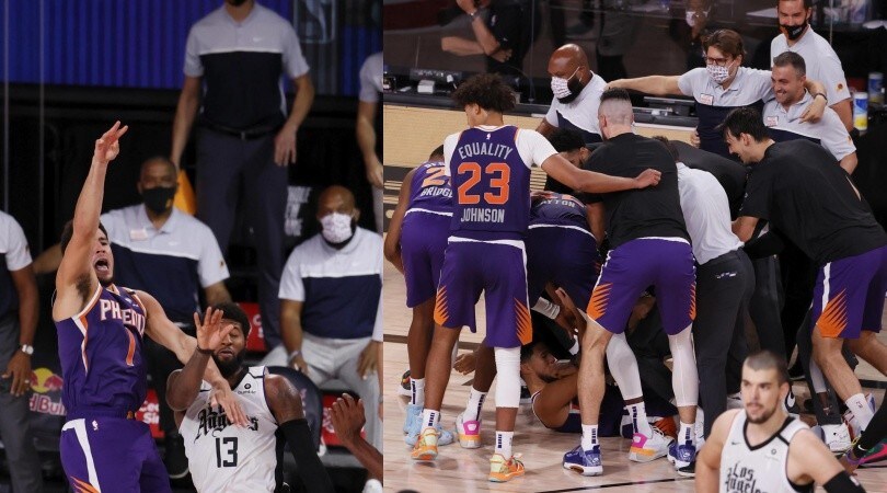 Nba, Booker beffa i Clippers con una magia sulla sirena