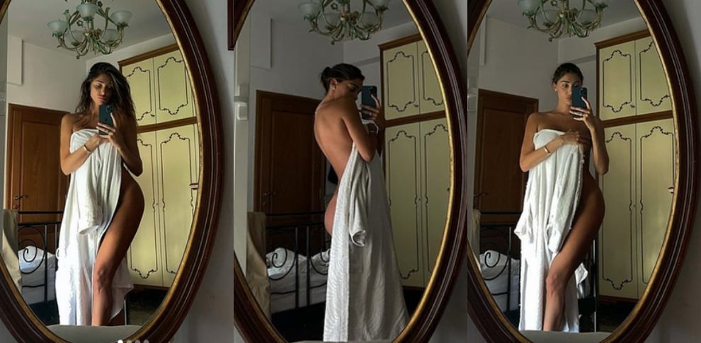 Belen Rodriguez, l'asciugamano scivola e svela il lato B