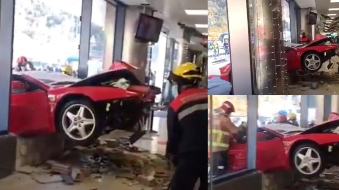 Ferrari 512 Testarossa contro la vetrata di un centro commerciale