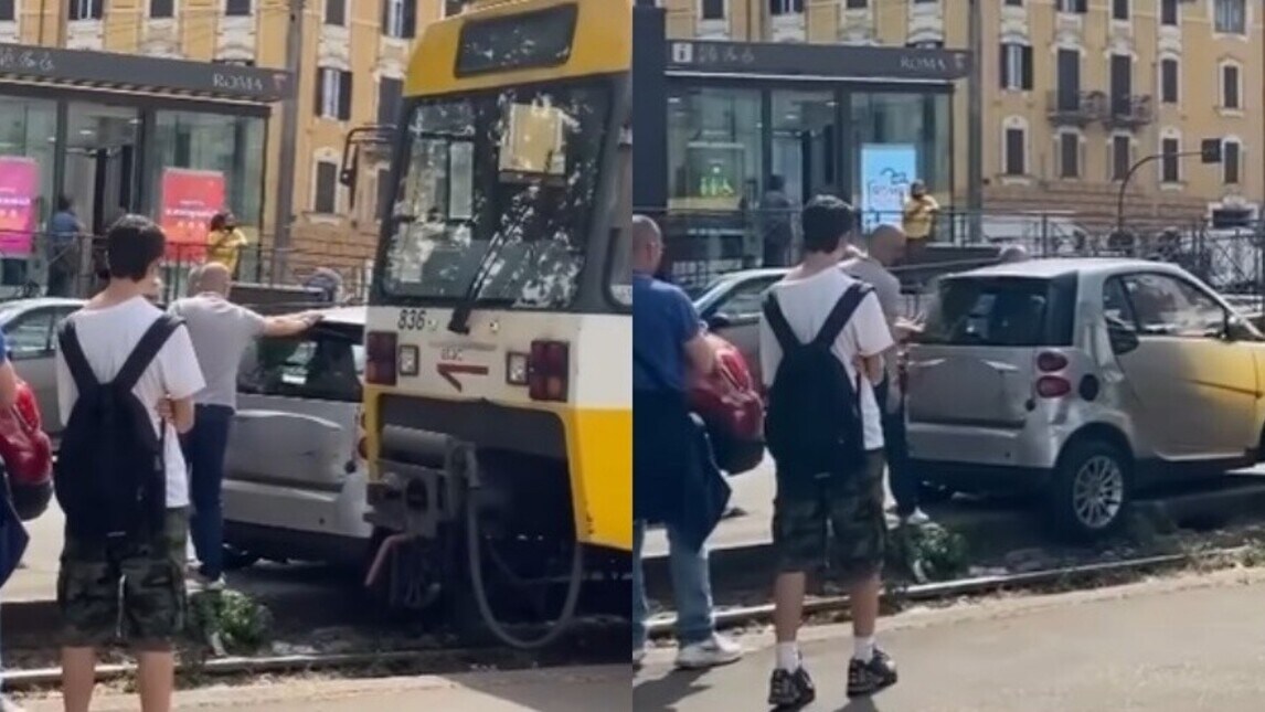 Roma, parcheggia la smart vicino le rotaie a San Giovanni e crea il caos