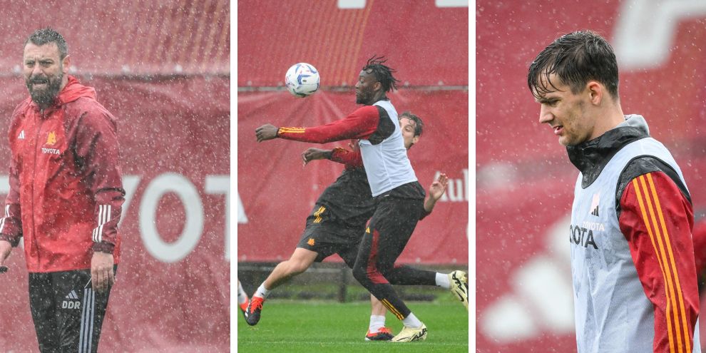 A Trigoria diluvia, ma De Rossi porta la Roma in campo ad allenarsi: le FOTO