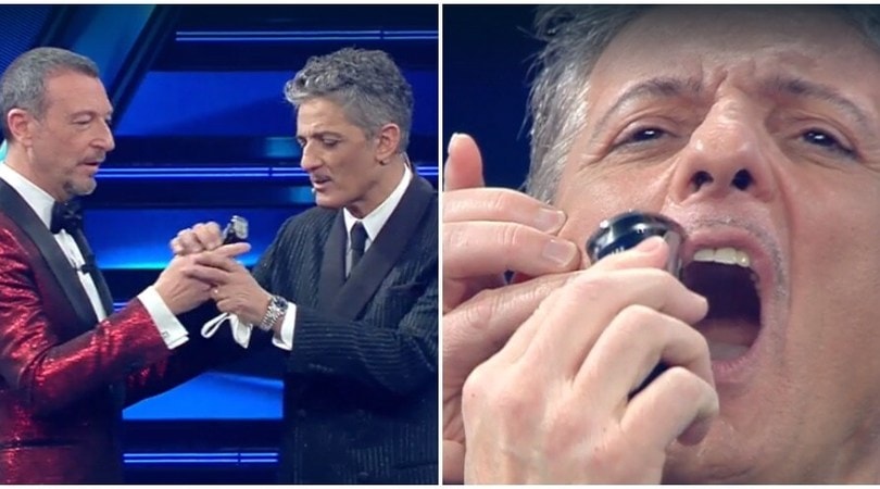 Amadeus si improvvisa barbiere e taglia i baffi a Fiorello
