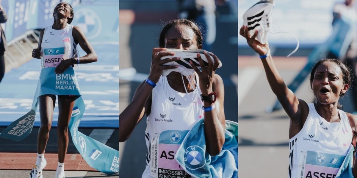 Tigist Assefa vince la maratona di Berlino: il bacio alle scarpe è da record