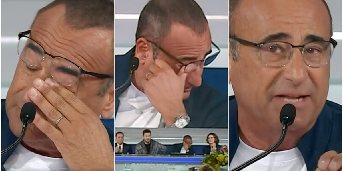 Carlo Conti scoppia a piangere in conferenza a Sanremo: il ricordo della mamma è da brividi