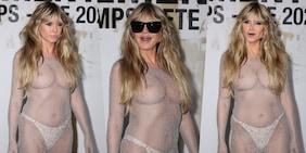 Heidi Klum travolgente a Parigi: trasparenze hot e denti d'argento