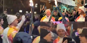 Chivu tedoforo di Milano Cortina 2026: le foto dell'entusiasmo a Milano