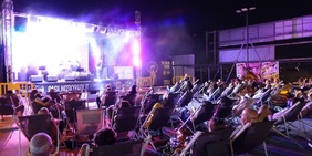 Dal cemento al colore: nasce FLO’ – FuoriLuogO, il festival sospeso sul tetto di  Roma