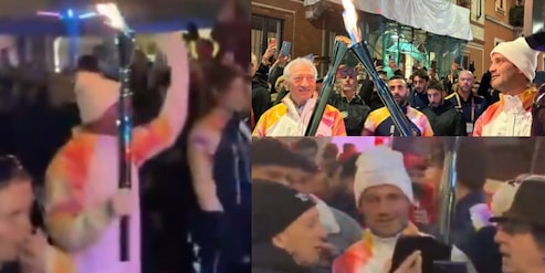 FOTO Chivu tedoforo di Milano Cortina 2026: le foto dell'entusiasmo a Milano