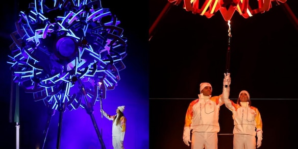 Olimpiadi, acceso il braciere: l'emozione di Tomba e Compagnoni all'Arco della Pace e Goggia a Cortina