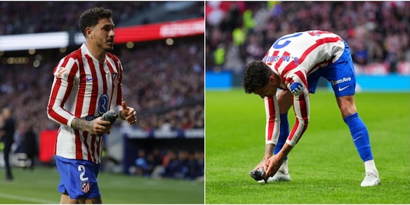 Gimenez salva un uccello ferito in campo da una pallonata durante Atletico Madrid-Real Sociedad: ovazione dello stadio