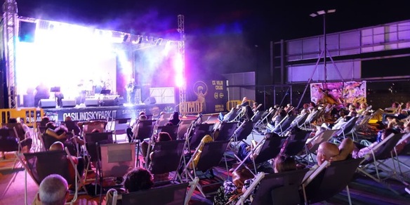 Dal cemento al colore: nasce FLO’ – FuoriLuogO, il festival sospeso sul tetto di  Roma