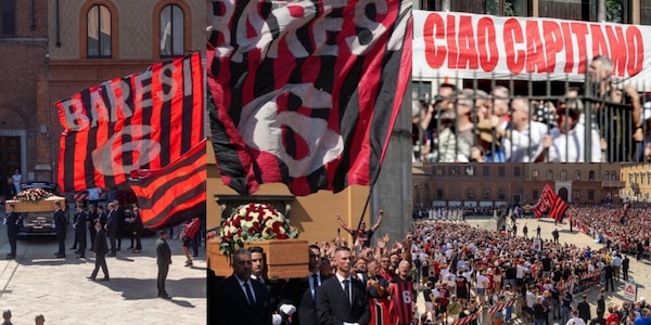 L'ultimo abbraccio vicino alla bara, i cori e gli striscioni: i tifosi del Milan salutano così Baresi