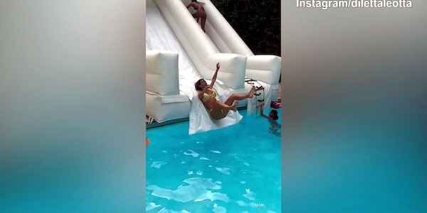 Tuffo in acqua dallo scivolo per la coppia Leotta-Karius