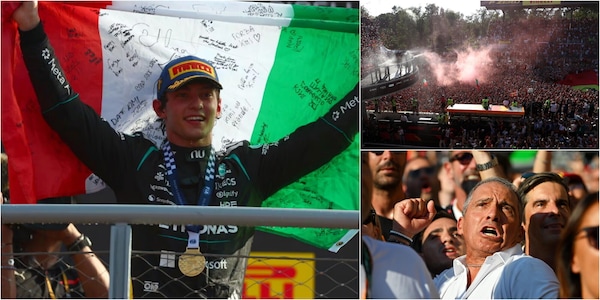 Antonelli si commuove con il tricolore in mano davanti al papà e a una marea rossa tutta per lui